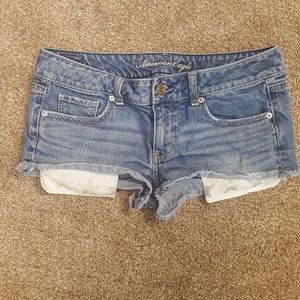American Eagle shorts with exposed pockets
